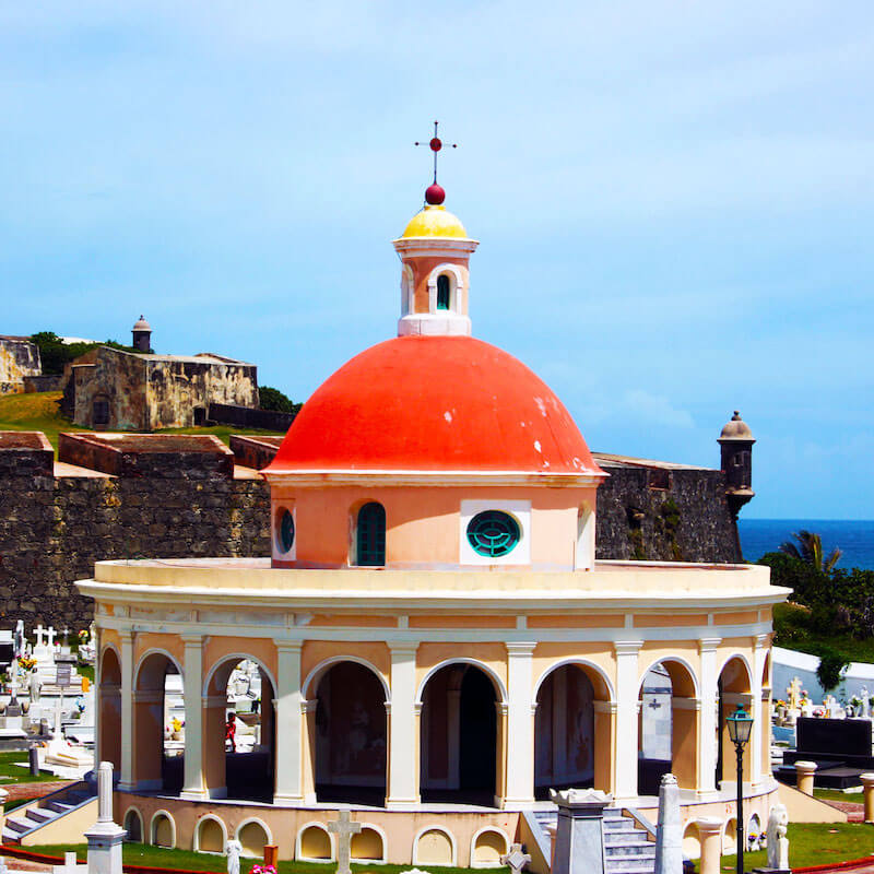 A historic red-domed building in San Juan, Puerto Rico